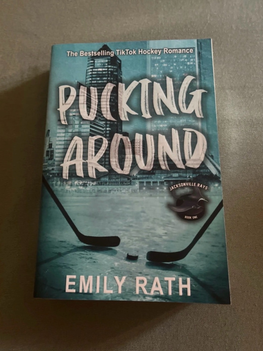 Pucking Around by Emily Rath - Teal Hockey Romance Paperback